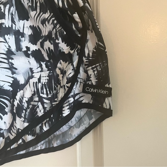 Calvin Klein running shorts black and white. Tie string and built in underwear. - Picture 2 of 7